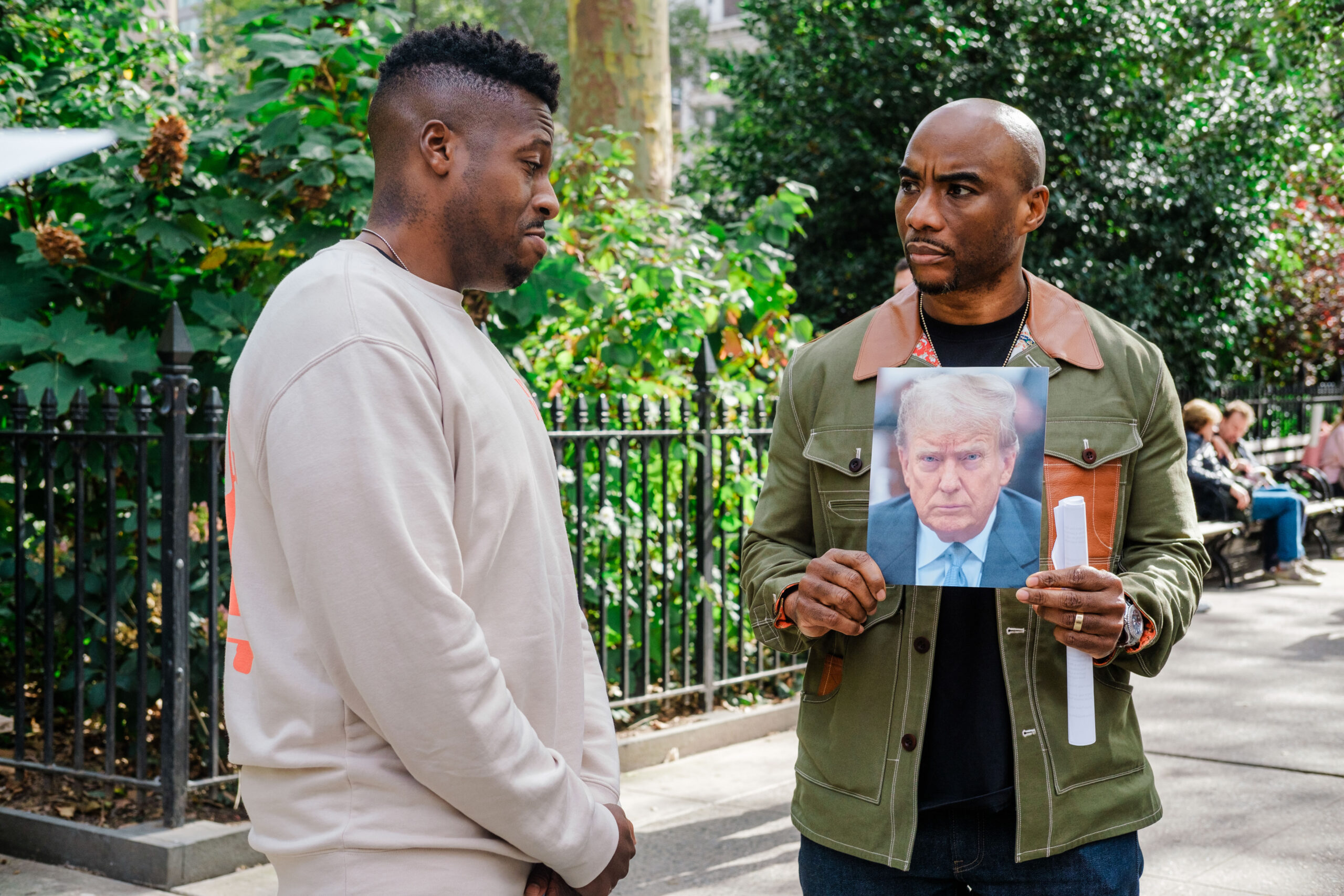 Charlamagne, right, films a man on the street segment for “The Daily Show” in October 2023.
