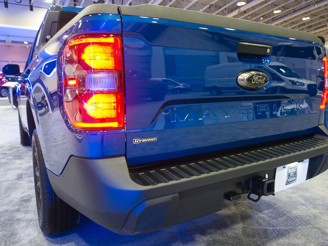 The tailgate of a Ford Maverick hybrid pickup truck at the Washington Auto Show in 2024.